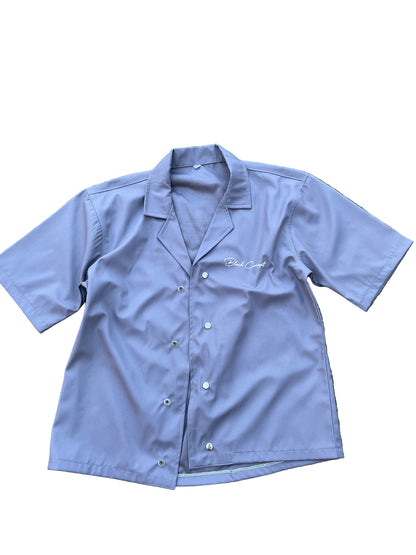 Bonded top with buttons